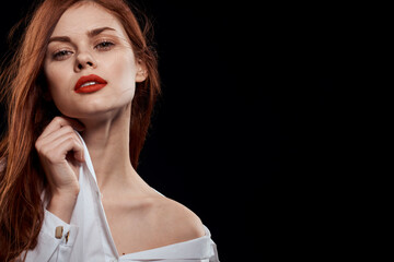 beautiful woman elegant style red lips unbuttoned white shirt close-up black background