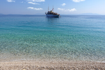 Obraz premium Beautiful turquoise paradise secluded pebble beach of Gidaki only accessible by path, Ithaki or Ithaca island, Ionian, Greece