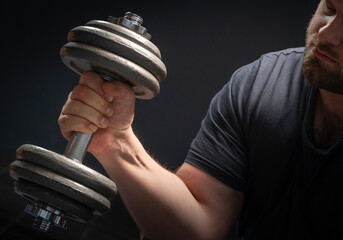 Muscle shaped body man with weights.