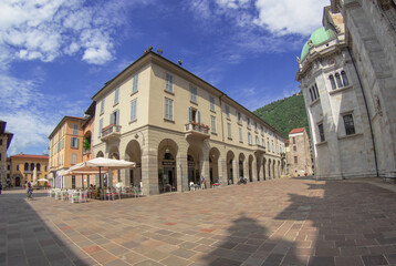Fototapeta premium Downtown deserted city square scene at afternoonHistoric center of Como,view on cathedral and arcades.