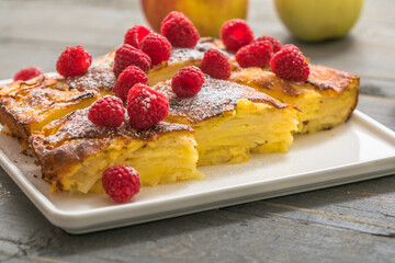 Piece of fresh baked homemade layered apple pie.