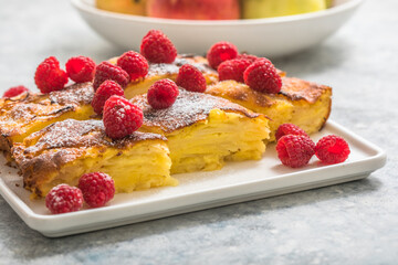 Piece of fresh baked homemade layered apple pie.