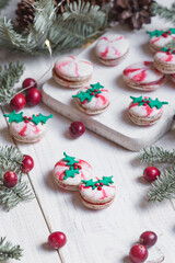 Fototapeta na wymiar Christmas cranberry & candy cane macaroon cookies