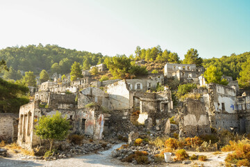 Obraz premium Historical Lycian village of Kayakoy, Fethiye, Mugla, Turkey. Ghost Town, anciently known as Lebessos and Lebessis. Abondoned Greek and turkish village