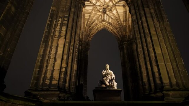 Night view of the famous Scott Monument, a Victorian Gothic monument to Scottish author Sir Walter Scott in Edinburgh, Scotland, UK
