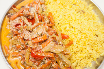 Closeup of plate with basmati rice plate and vegetables 