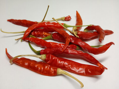 picture of kashmiri chilli (mirch) in isolated white background
