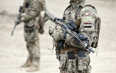 Soldiers with machine gun and flag of Syria on military uniform. Collage.