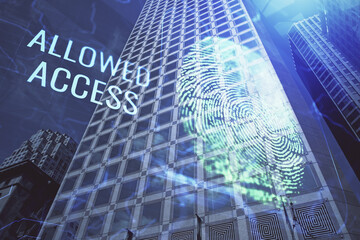 Double exposure of finger print hologram and cityscape background. Concept of personal security.