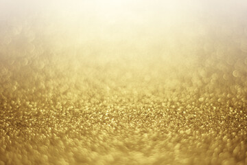 gold bokeh glitter abstract background for Christmas and Valentine.