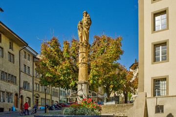 Fototapeta na wymiar statue of Sainte-Anne the patron saint of the tanners corporation in Fribourg, Switzerland