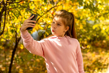 
little girl taking a selfie