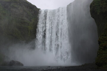 Skogafoss Waterfall in South Iceland on a misty summer day