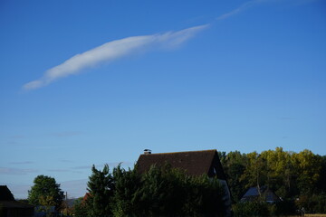 Fototapeta na wymiar a single cloud in the sky