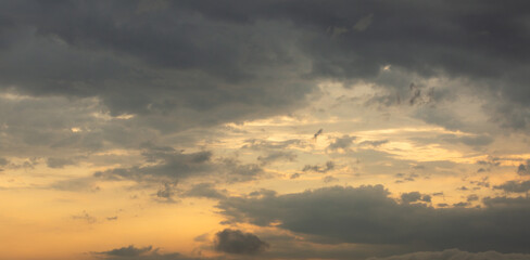 colorful dramatic sky with cloud at sunset