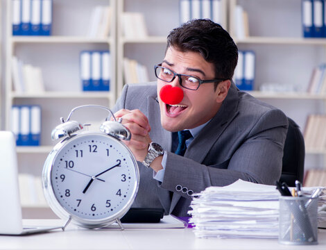 The clown businessman with alarm clock missing dieadline
