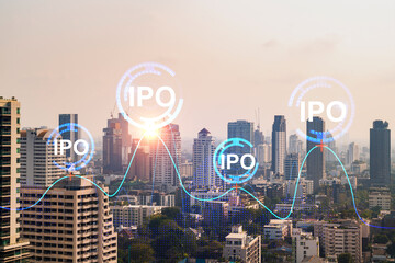 IPO icon hologram over panorama city view of Bangkok, the hub of initial public offering in Asia....
