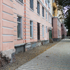 Restoration of old building. Construction of new sidewalk.