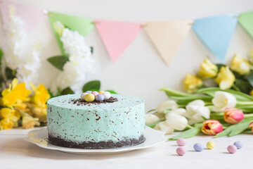 Easter pastel robins egg cheesecake and spring flowers
