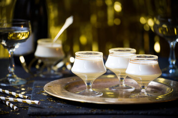 Festive black & gold desserts in glasses