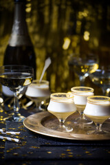 Festive black & gold desserts in glasses