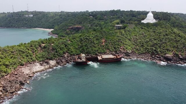 The rusty shipwreck run aground. Sri Lanka