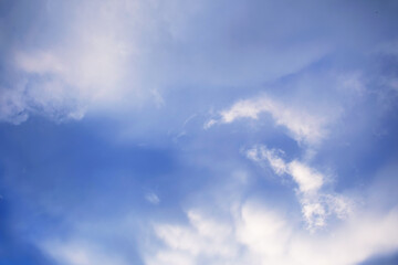 Naklejka na ściany i meble Fluffy clouds, atmosphere background, blue sky with clouds, copy space