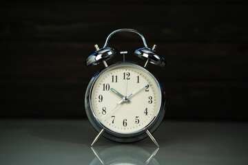 Retro alarm clock on table