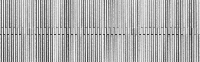 Panorama of Modern white stone wall with stripes texture and seamless background