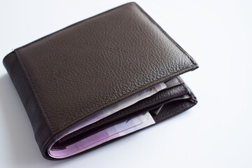 top view brown leather wallet isolated on white background