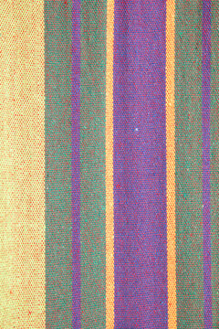 Striped crisp colorful fabric. multicolored stripes on the fabric. color background.