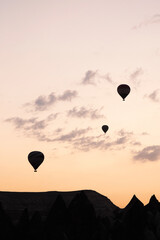 Background of flying balloons in the sky of Cappadocia. Holidays in Turkey, travel during a pandemic