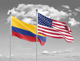 Obraz premium Two realistic flags. United States of America vs Colombia. Thick colored silky flags of America and Colombia. 3D illustration on sky background. - Illustration