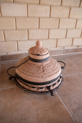 tandoor. brazier. preparation of meat and vegetables in nature.