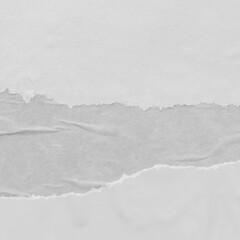 Fototapeta premium White torn paper collage close-up. Texture made from various paper and cardboard parts. Damaged old paper background. Vintage blank wallpaper. Material design backdrop.