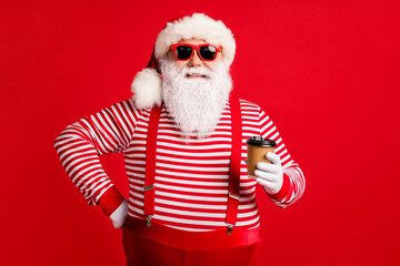 Fototapeta na wymiar Portrait of his he nice handsome attractive cheerful cheery Santa father drinking takeout beverage cafe service isolated bright vivid shine vibrant red color background