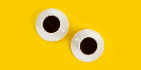 Cup coffee isolated on yellow