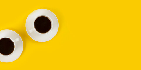 Cup coffee isolated on yellow