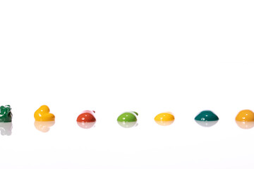 Set of colorful acrylic paint smears isolated on white background. Oil paint palette on table. Art, artist workshop, drawing hobby, creative, design, inspiration, uniqueness concept. Copy space