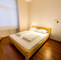 Fototapeta na wymiar Double bed in the hotel