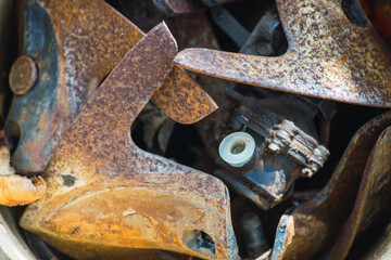 rusty iron tools inside a bucket