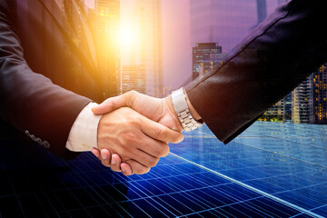 Businessmen are shaking hands for business venture and Marketing on energy