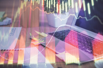 Multi exposure of forex chart and work space with computer. Concept of international online trading.