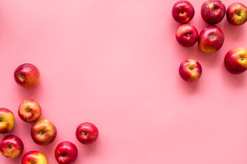 Frame of red apples on kitchen table top view