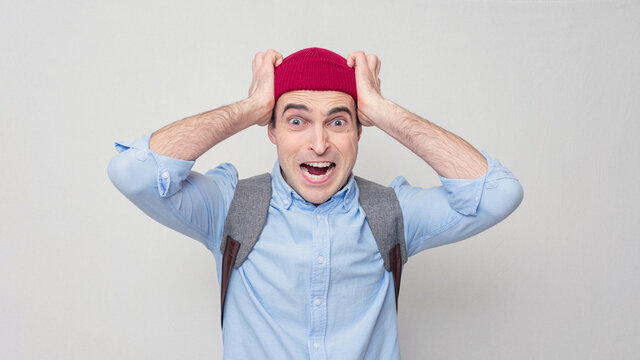 Angry Student Failed The Session, Guy Is Terribly Upset And Yelling, White Background, Portrait, 16:9