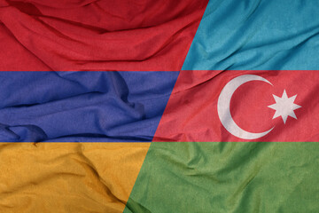 Flags of armenia and azerbaijan on textile background