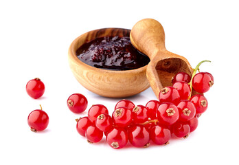 Red currant berries with currant jam on White Background. Currant jam in wooden bowl with ripe berries.