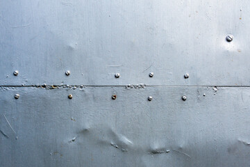 metal surface with paint worn paint. Background wall.