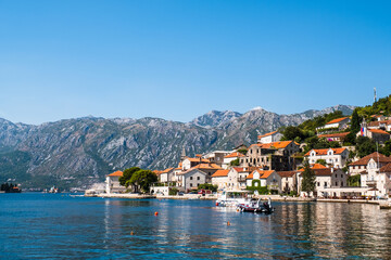 Fototapeta na wymiar Beautiful mediterranean landscape - town Perast, Kotor bay, Montenegro. Balkans, Adriatic sea, Europe.
