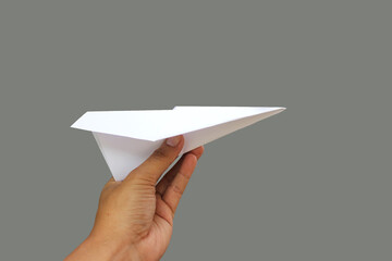 paper plane in a hand